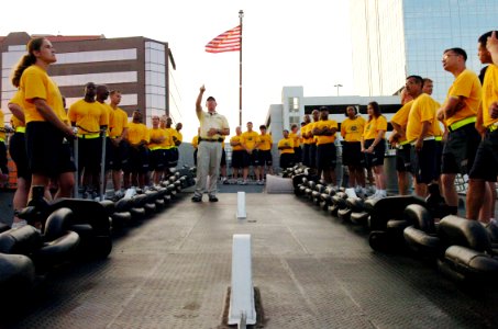 US Navy 080825-N-5758H-125 Mike Bushner explains the functions of the radars aboard the battleship USS Wisconsin (BB 64)