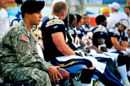 US Navy 080825-N-0640K-059 Army Spc. Joseph Serino sits on the San Diego Chargers bench during the second quarter of the San Diego Chargers 20th-annual Salute to the Military game held at Qualcomm Stadium