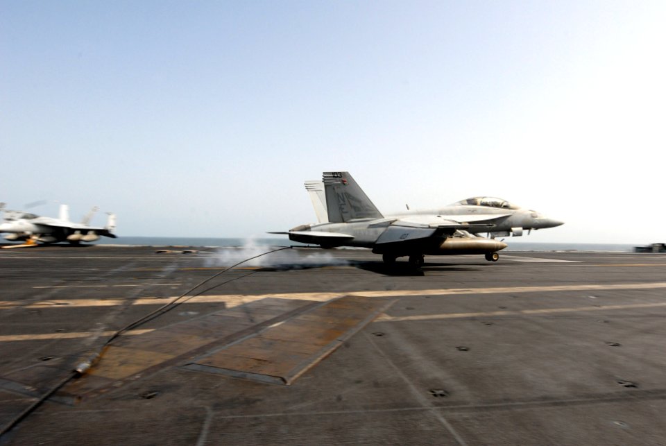 US Navy 080901-N-7730P-073 Rear Adm. Scott R. Van Buskrik makes an arrested landing