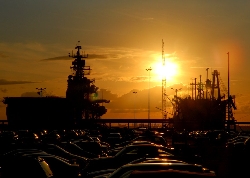 US Navy 080822-N-7668G-001 The multipurpose amphibious assault ship USS Iwo Jima (LHD 7), left, and the Military Sealift Command fast combat support ship USNS Arctic (T-AOE 8) sit moored at Naval Station Norfolk's Pier 12 durin