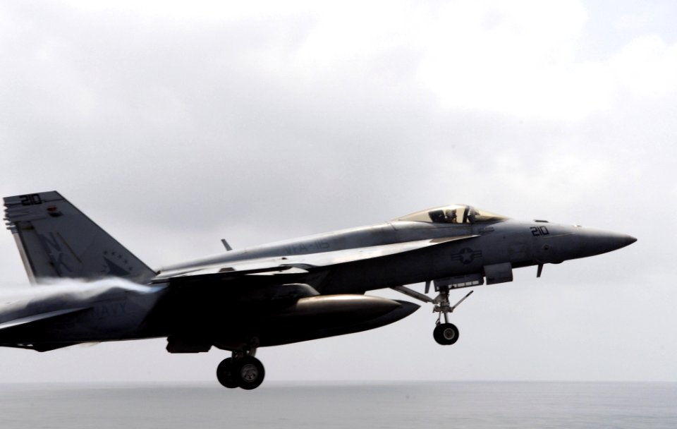 US Navy 080828-N-3659B-109 An F-A-18E Super Hornet launches off of the waist catapults on the flight deck of the Nimitz-class aircraft carrier USS Ronald Reagan (CVN 76)