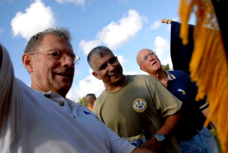 US Navy 080823-N-9818V-541 Master Chief Petty Officer of the Navy (MCPON) Duane R. Bushey, MCPON Joe R. Campa Jr. and MCPON Robert Walker judge the guidons for the fourth annual