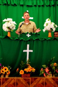 US Navy 080823-N-5642P-027 Lt. Quinn O'Bannon gives a sermon during Mass photo