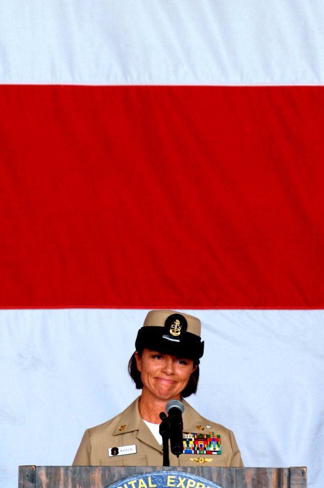 US Navy 080825-N-9818V-244 Chief Aviation Warfare Systems Operator Kathleen Reilly, Commander, Navy Reserve Sailor of the Year, addresses her guest after being meritoriously promoted to chief petty officer during the 2008 Navy