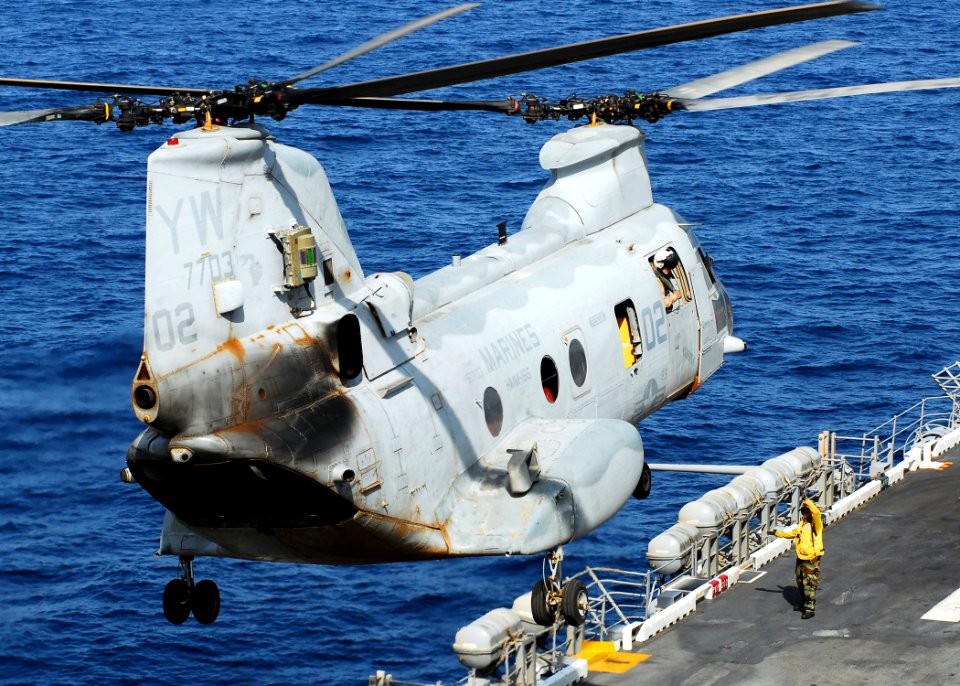 US Navy 080902-N-2183K-128 A CH-46E Sea Knight helicopter rises off the flight deck of the amphibious assault ship USS Peleliu (LHA 5)