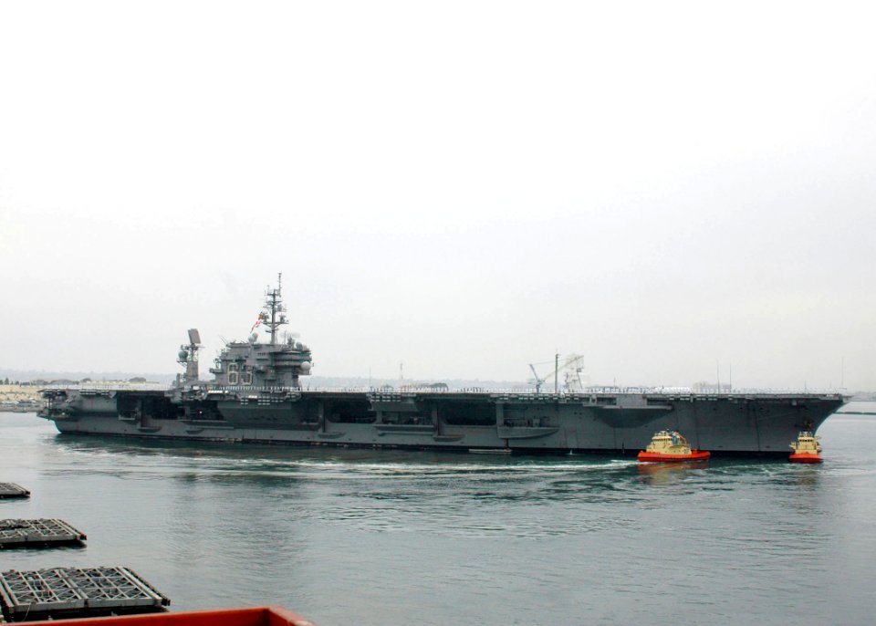 US Navy 080828-N-9076B-003 The aircraft carrier USS Kitty Hawk (CV 63) pulls away from the pier at Naval Air Station North Island Calif