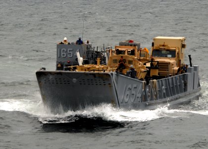 US Navy 080826-N-3392P-105 A landing craft utility assigned to Assault Craft Unit (ACU) 2 prepares to embark aboard the amphibious dock landing ship USS Carter Hall (LSD 50) photo