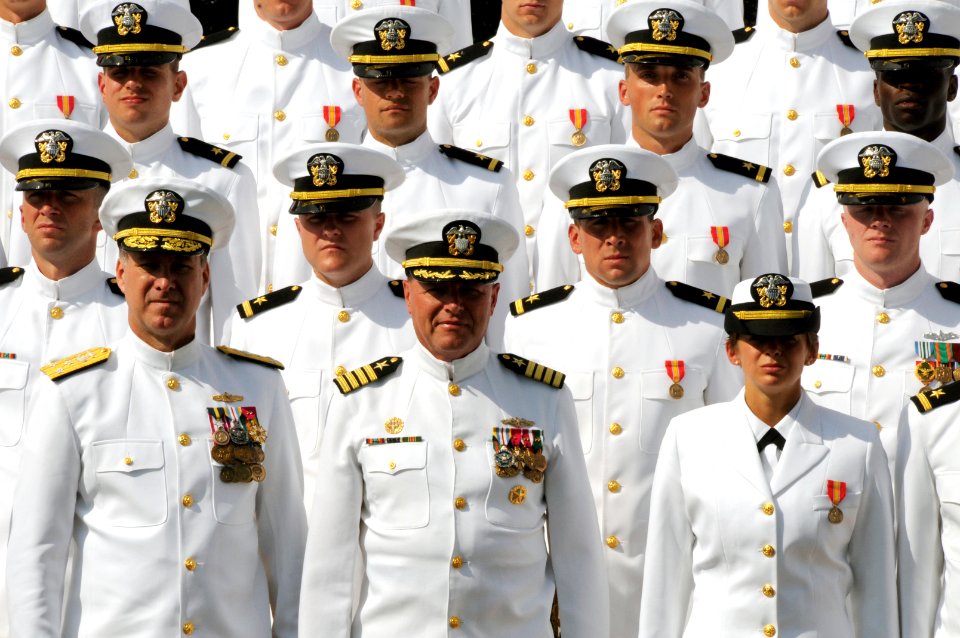 US Navy 080829-N-8848T-487 newly commissioned Ensigns and graduates from Officer Candidate School