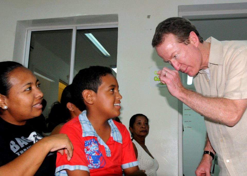 US Navy 080829-N-5642P-025 U.S. Ambassador to Colombia William Brownfield speaks with a patient