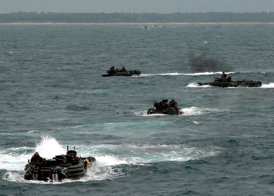 US Navy 080828-N-3392P-167 Amphibious assault vehicles prepare to embark aboard the amphibious dock landing ship USS Carter Hall (LSD 50)