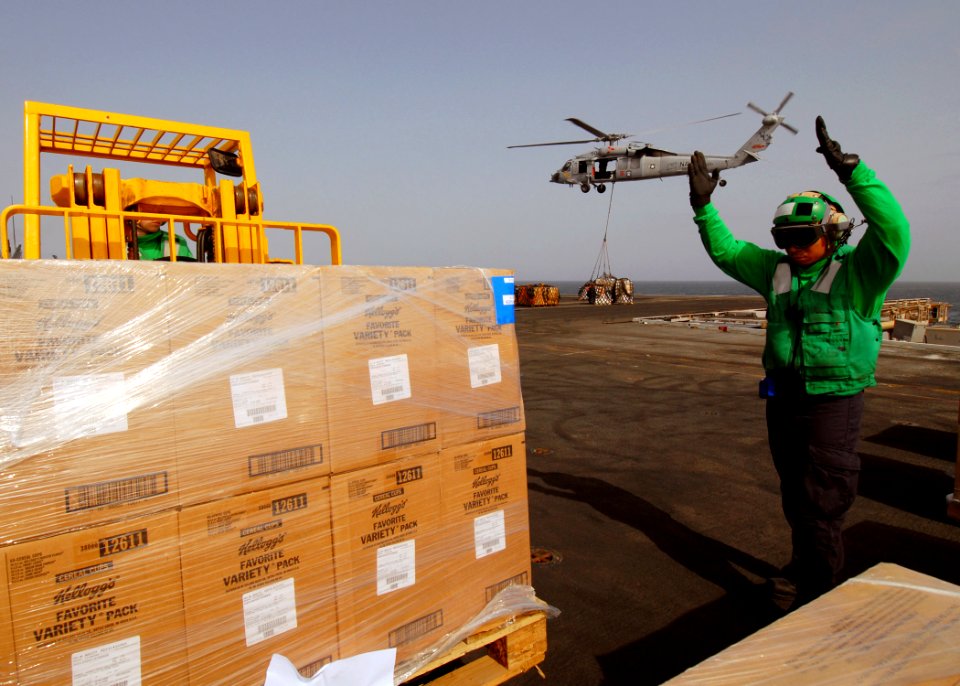 US Navy 080901-N-9079D-093 Sailors receive supplies during an underway replenishment