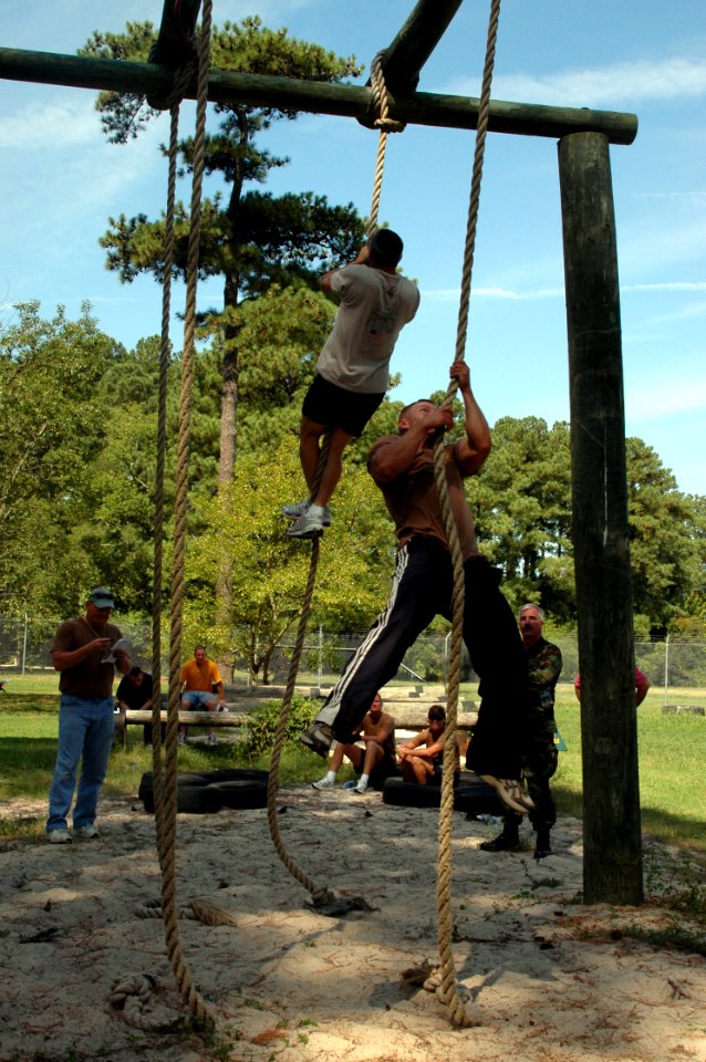 US Navy 080903-N-9095H-121 Navy Expeditionary Combat Command (NECC) personnel compete in the rope climb event during the NECC inaugural Toughman Competition