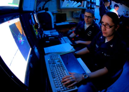 US Navy 080904-N-9079D-037 Operations Specialist 3rd Class Sarah M. Hernandez stands the global command and control systems-maritime watch