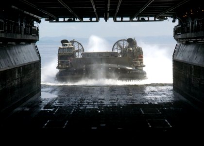 US Navy 080901-N-5253W-002 Landing craft air cushion (LCAC) 63, assigned to Assault Craft Unit (ACU) 5, enters the well deck of the forward-deployed amphibious assault ship USS Essex (LHD 2)