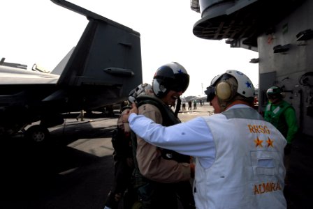US Navy 080901-N-7730P-128 Rear Adm. Scott R. Van Buskrik is greeted on the flight deck of the Nimitz-class aircraft carrier USS Ronald Reagan (CVN 76)