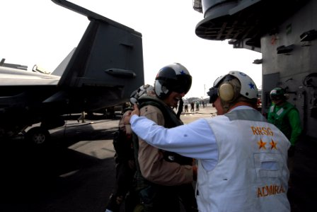 US Navy 080901-N-7730P-128 Rear Adm. Scott R. Van Buskrik is greeted on the flight deck of the Nimitz-class aircraft carrier USS Ronald Reagan (CVN 76) photo