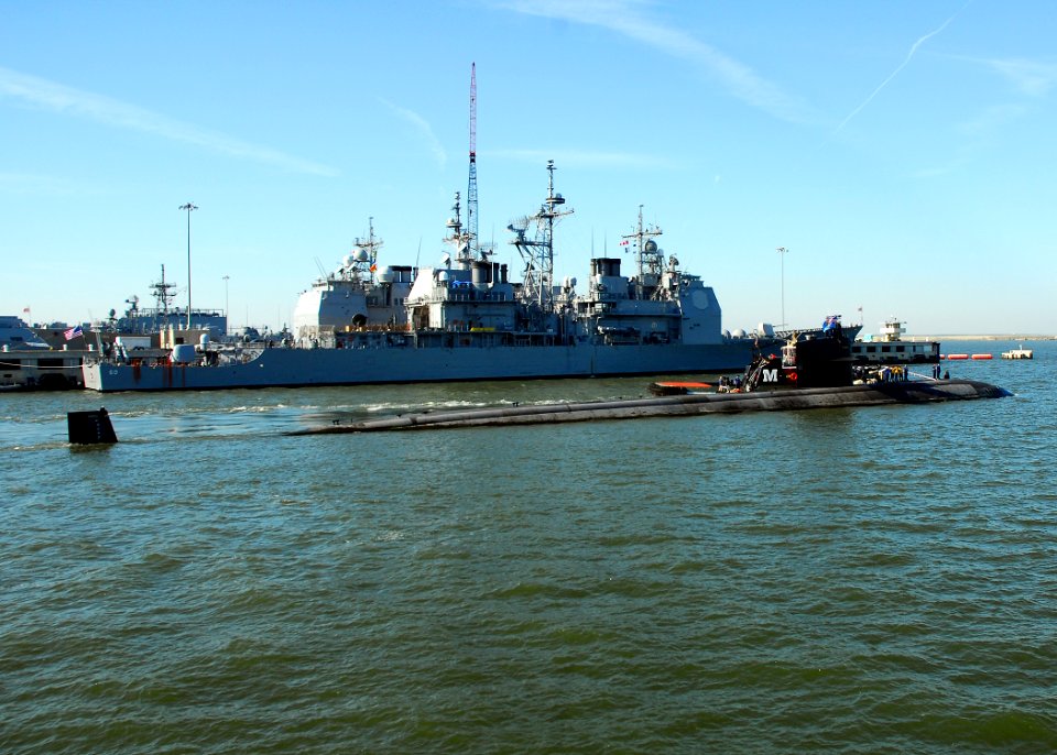 US Navy 080903-N-7705S-077 The Los Angeles class fast-attack submarine USS Oklahoma City (SSN 723) departs Naval Station Norfolk near the Ticonderoga class guided-missile destroyer USS Normandy (CG 60)