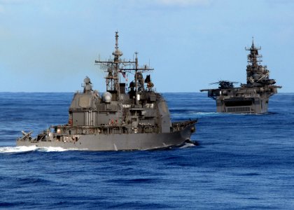 US Navy 080906-N-3392P-157 The guided-missile cruiser USS Vella Gulf, left, (CG 72) and the multi-purpose amphibious assault ship USS Iwo Jima (LHD 7) transit the Atlantic Ocean