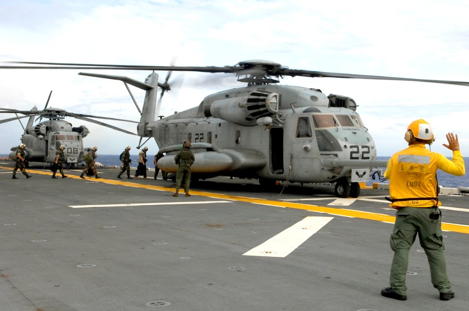 US Navy 080907-N-1508S-022 Sailors assigned to the amphibious assault ship USS Kearsarge (LHD 3) depart for Haiti aboard a CH-53E Super Stallion helicopter to provide disaster relief in hurricane-affected areas