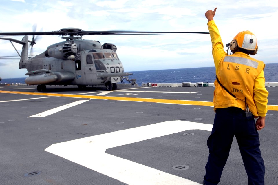 US Navy 080907-N-1508S-050 Sailors assigned to the amphibious assault ship USS Kearsarge (LHD 3) depart for Haiti aboard a CH-53E Super Stallion helicopter to provide disaster relief in hurricane-affected areas