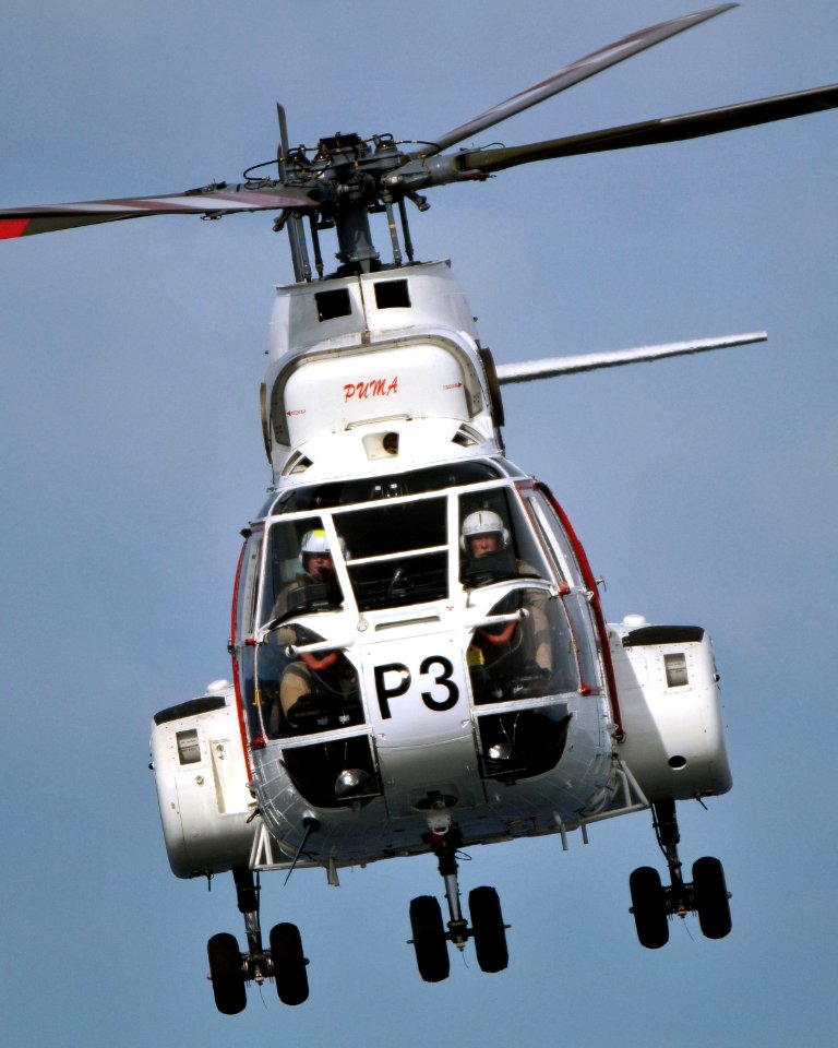 US Navy 080907-N-7981E-112 An AS-332 Super Puma helicopter approaches the Military Sealift Command dry cargo-ammunition ship USNS Richard C. Byrd (T-AKE 4) to pick up supplies during a vertical replenishment at sea