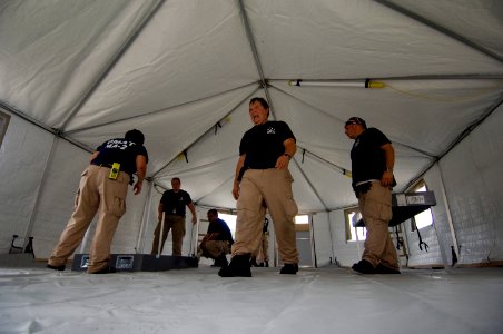 US Navy 080903-N-4154B-011 The FEMA Disaster Medical Assistance Team sets up emergency assistance medical tents