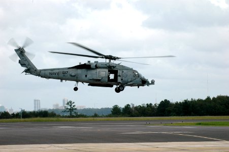 US Navy 080901-N-1522S-003 A helicopter crew assigned to Helicopter Anti-Submarine Squadron (HS) 7, departs Naval Air Station Jacksonville