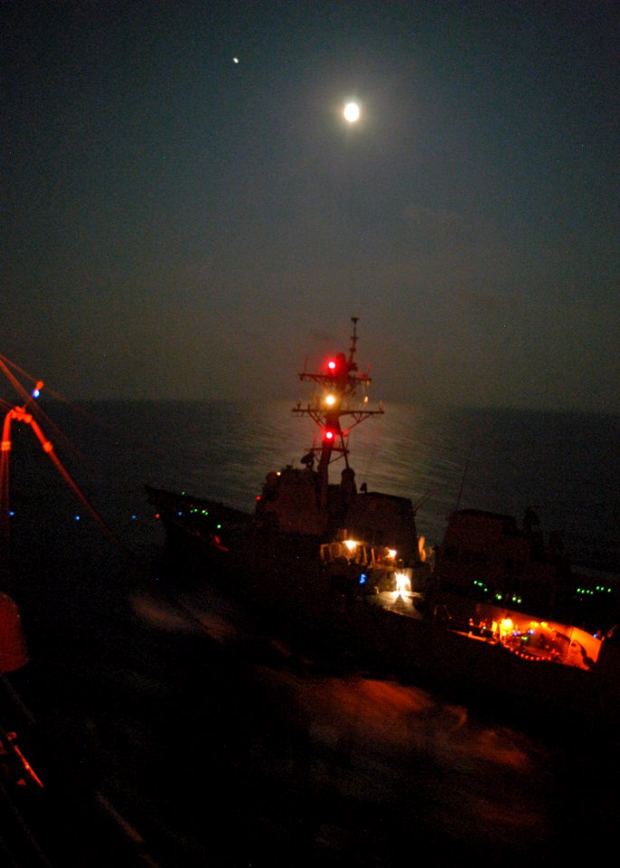 US Navy 080908-N-8154G-007 USS James E. Williams (DDG 95) receives fuel during a fueling-at-sea with the multi-purpose amphibious assault ship USS Bataan (LHD 5)