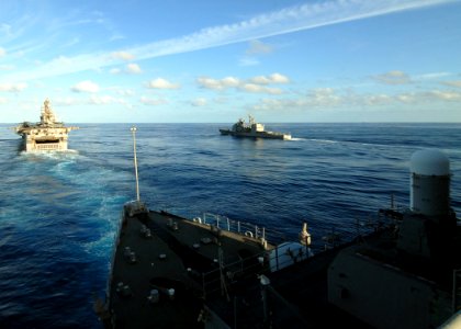 US Navy 080906-N-3392P-295 The amphibious dock landing ship USS Carter Hall (LSD 50) transits the Atlantic Ocean in formation with the multi-purpose amphibious assault ship USS Iwo Jima (LHD 7), left, and the guided-missile cr