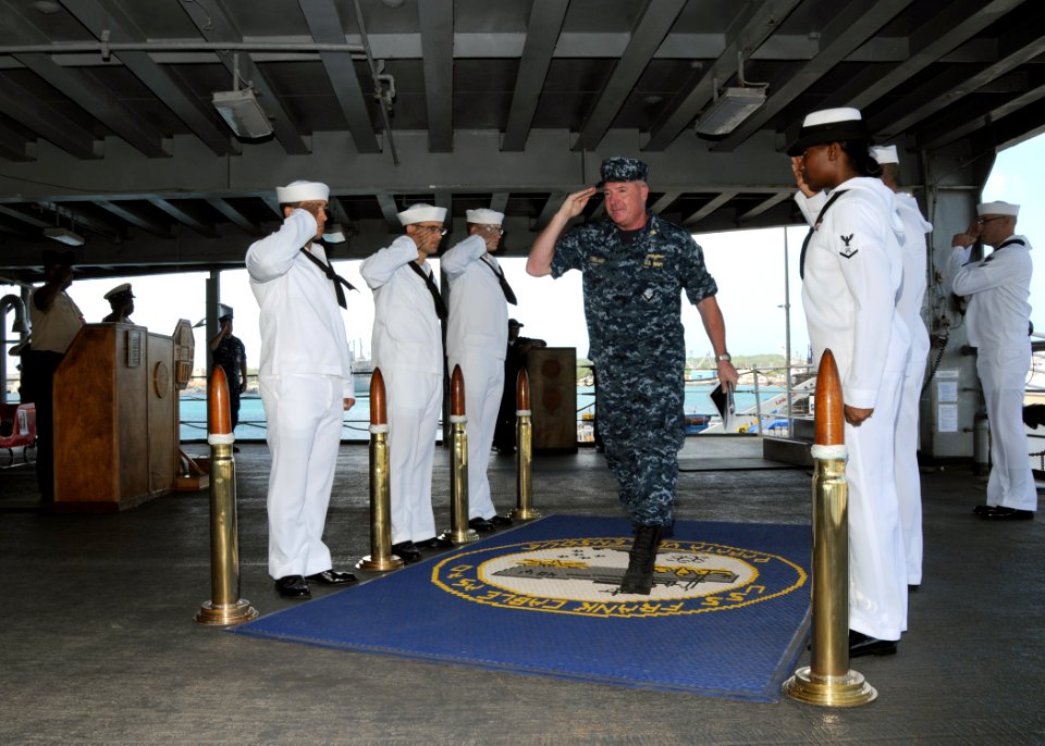 US Navy 111129-N-UE250-013 Side boys render honors