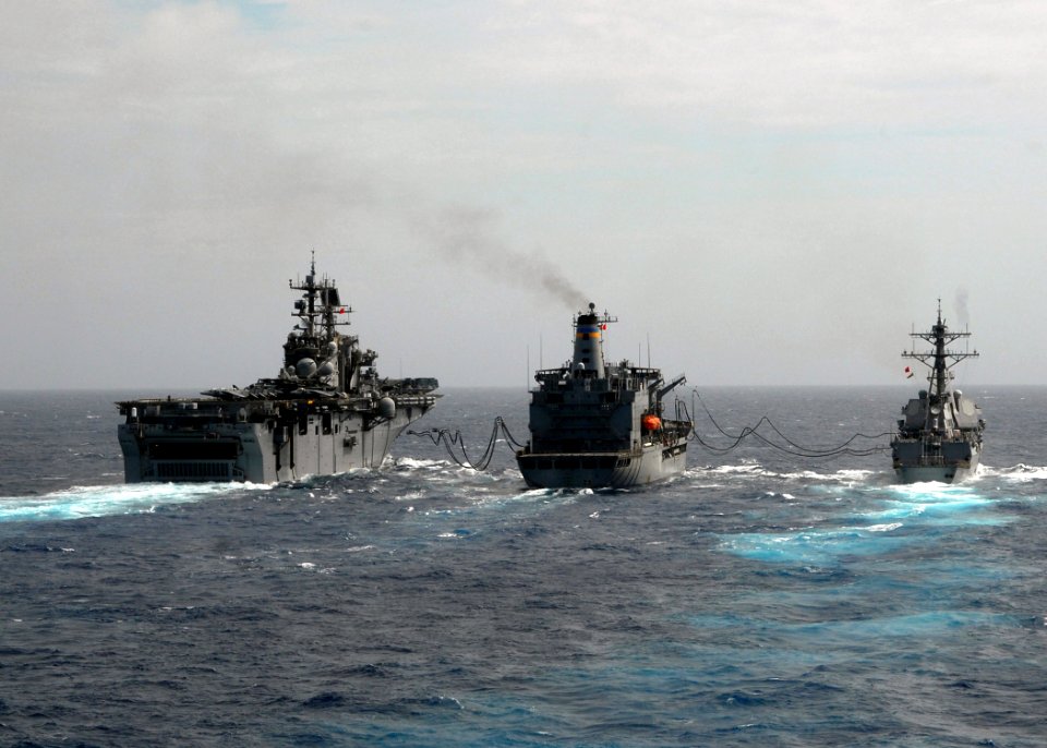 US Navy 080903-N-9134V-050 The multi-purpose amphibious assault ship USS Iwo Jima (LHD 7) and the guided-missile destroyer USS Roosevelt (DDG 80) conduct a replenishment at sea
