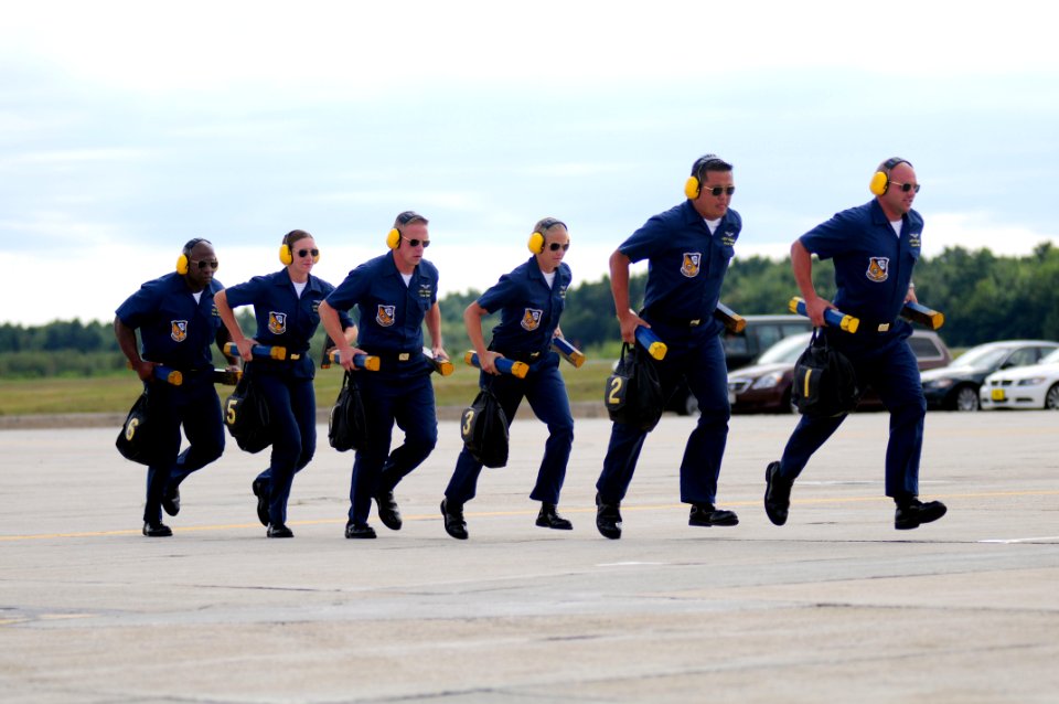 US Navy 080907-N-0411D-023 Blue Angel Plane Captains run from the runway as part of the U.S. Navy flight demonstration team The Blue Angels performance at The Great State of Maine Air Show