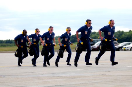 US Navy 080907-N-0411D-023 Blue Angel Plane Captains run from the runway as part of the U.S. Navy flight demonstration team The Blue Angels performance at The Great State of Maine Air Show