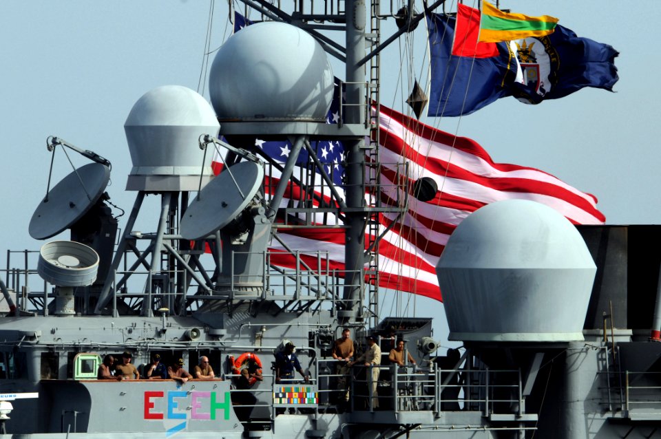 US Navy 080911-N-3659B-199 Sailors stand on the port bridge wing of the guided-missile cruiser USS Chancellorsville (CG 62) during a replenishment at sea with the USNS Bridge (T-AOE 10)