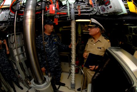 US Navy 111004-N-NK458-012 . Cmdr. James Colston, executive officer of the Los Angeles-class attack submarine USS Helena (SSN 725), explains contro
