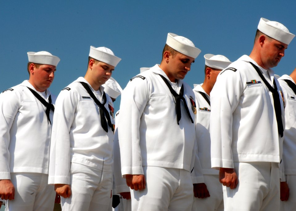 US Navy 080908-N-7668G-110 Crewmembers of the Virginia class attack submarine USS North Carolina (SSN 777) bow their heads in prayer during the North Carolina change of command ceremony at Naval Station Norfolk