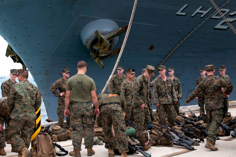 US Navy 111104-N-ER662-209 Marines inventory equipment after disembarking from the forward-deployed amphibious assault ship USS Essex