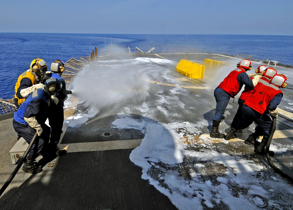 US Navy 080911-N-1082Z-035 Sailors from the flight deck firefighting team practice firefighting techniques