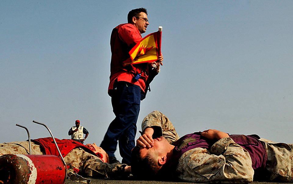 US Navy 110819-N-AG285-097 Sailors participate in an aircraft firefighting training exercise