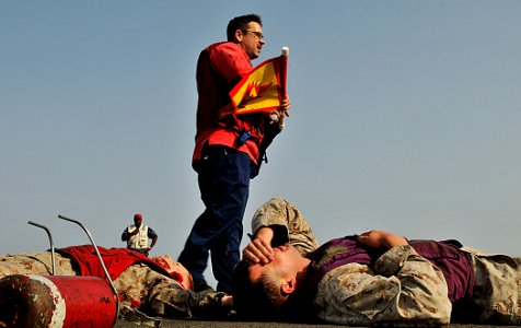 US Navy 110819-N-AG285-097 Sailors participate in an aircraft firefighting training exercise