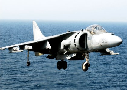US Navy 080912-N-2183K-032 An AV-8B Harrier hovers over the flight deck of the amphibious assault ship USS Peleliu (LHA 5) during flight operations