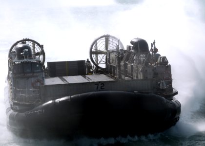 US Navy 080912-N-5148B-065 A Landing Craft Air Cushion from the amphibious dock landing ship USS Pearl Harbor (LSD 52) prepares to enter the ship's well deck