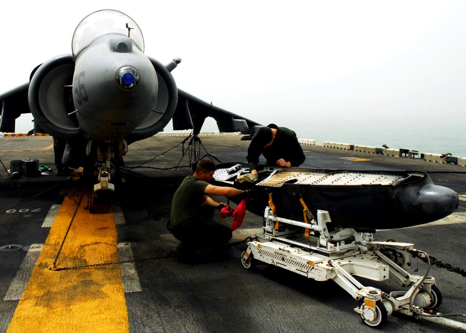 US Navy 080915-N-2183K-006 Marines clean and inspect the 25mm cannon of an AV-8B Harrier jet aboard the amphibious assault ship USS Peleliu (LHA 5)