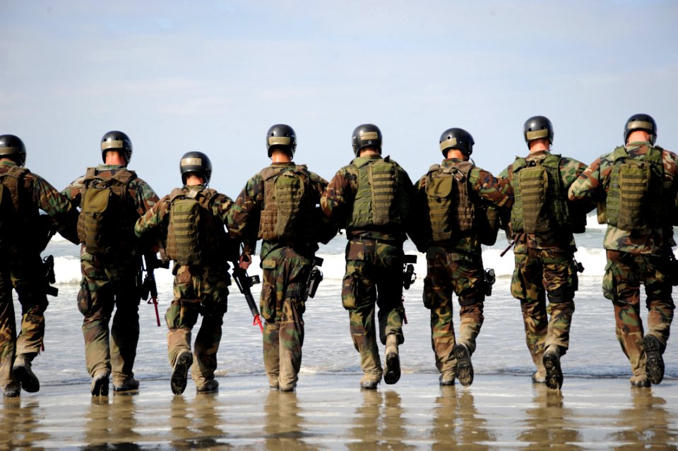 US Navy 080910-N-9552M-091 Crewman Qualification Training (CQT) students hit the surf before the start of medical training instruction at the Silver Strand beach in Coronado