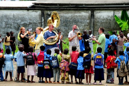 US Navy 080912-N-7526R-326 The Commander, Naval Forces Europe Band brass quintet plays for students during a community relations project
