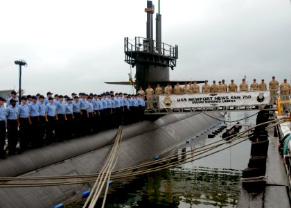US Navy 080911-N-7668G-006 The crew of the Los Angeles-class attack submarine USS Newport News (SSN 750) stands at attention for a moment of silence in memory of the victims of the September 11, 2001 terrorist attacks on New Yo