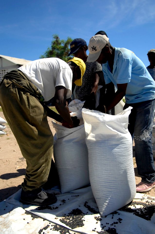 US Navy 080915-N-1508S-103 Haitian families receive food and fresh water from U.N. officials during relief efforts in areas of Haiti devastated by recent hurricanes