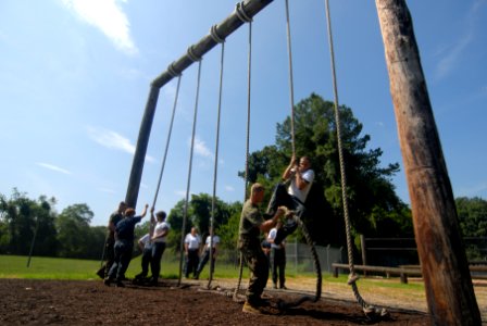 US Navy 110712-N-OA833-003 Plebes in the U.S. Naval Academy Class of 2015 make their way through the school's obstacle course