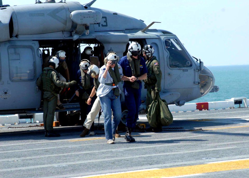 US Navy 080917-N-2838W-038 Lyda Anne Thomas, left, Mayor of Galveston, Texas, arrives aboard the amphibious assault ship USS Nassau (LHA 4)