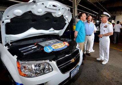 US Navy 110526-N-PO203-091 Rear Adm. Nevin P. Carr asks questions about the Office of Naval Research Fuel Cell vehicle